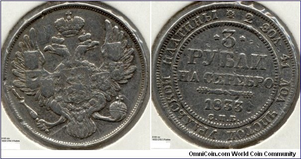 A sorely abused specimen of Russia's platinum coinage experiment from 1828-1845.  The coin is worn, has been cut with a knife twice, and is bent.  Proof that it and others in the series (in 6 and 12 ruble denominations) actually circulated, unlike all other platinum coinage.