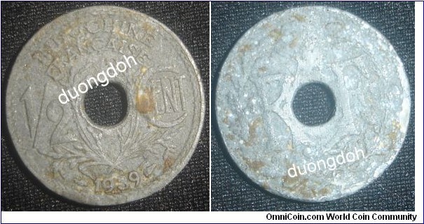 Extremely rare coin, KM#20a, 
Zinc, 21 mm. Obv: Center hole divides RF, liberty cap above,
wreath surrounds Rev: Denomination divided by center hole and
grain sprigs
Mintage: only 185,000 pieces for both 1939 and 1940