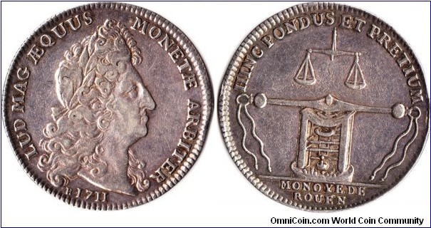 scarcer silver jeton minted for the administrators of the mint at Rouen in 1711. reverse shows the type of coin press in use at that time