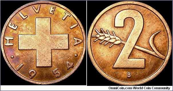 Switzerland - 2 Rappen - 1954 - Weight 2,5 gr - Bronze - Size 20,0 mm - Thickness 1,25 mm - Alignment Medal (0°) - Engraver J.Tannheimer - Edge : Smooth - Mintage 2 530 000 - Reference KM# 47 (1948-74)