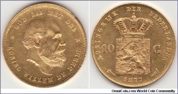 The obverse features King William III surrounded by the Dutch inscription GOD ZIJ MET ONS, (God Is With Us) at the top and KONING WILLEM DE DERDE, (King William III).
The reverse has the royal arms surrounded by the country's name KONINGRIJK DER NEDERLANDEN (Kingdom of The Netherlands) in Dutch with the date 1877 below the arms flanked by the broadaxe privy mark on the left and the caduceus mint mark for the Utrecht mint. The denomination 10 G flanks the arms.
