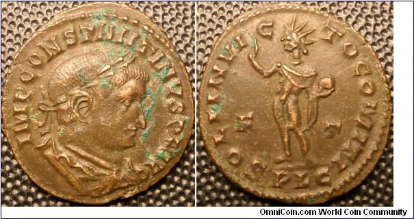 Lyons
RIC VI 310 	Constantine I AE Follis. Struck circa 309-310 AD. IMP CONSTANTINVS P F AVG, laureate, draped and cuirassed bust right, seen from the back / SOLI INVIC-TO COMITI, Sol standing facing, head left, chlamys hanging behind from left shoulder, holding globe and raising right hand. F-T across fields, mintmark PLG:Mint of Lugdunum. 23mm 4.2gms