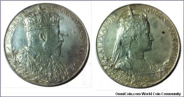 1902 Great Britian Edward VII Coronation Meda by George William DeSaullesl. Silver 56MM.
Obv: Crowned bust of Edward VII facing right. Rev: Crowned bust of Alexandra facing right. 
