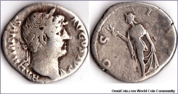 Hadrian silver denarius minted circa 125ad. Reverse shows Spes to left raising her hem, and holding a flower